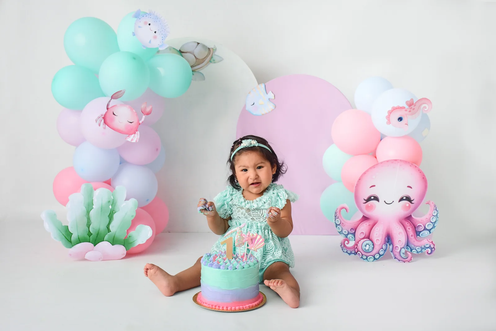 Sesión temática marina con pulpo y globos pastel
